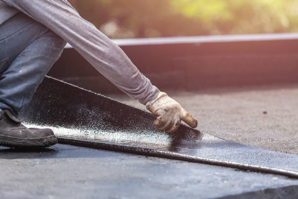 Professional Waterproofing technician working in Oconomowoc, WI